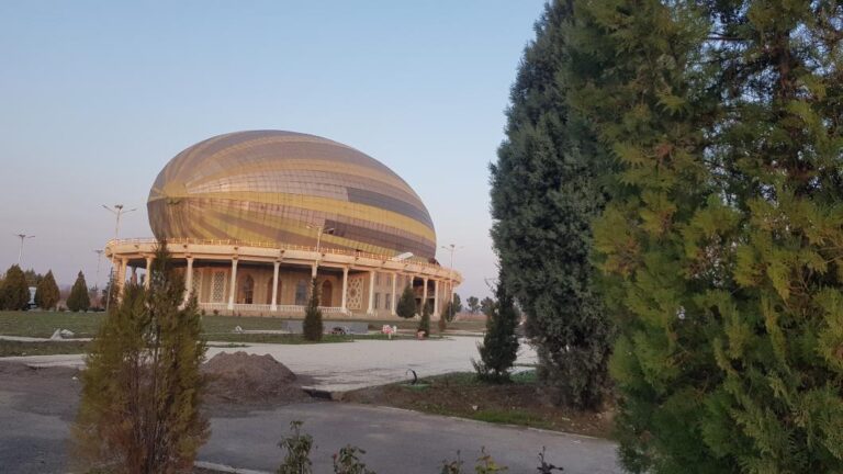 An unusual building with a pumpkin structure on top in Hisor. Tajikistan, the Smallest Country in Central Asia