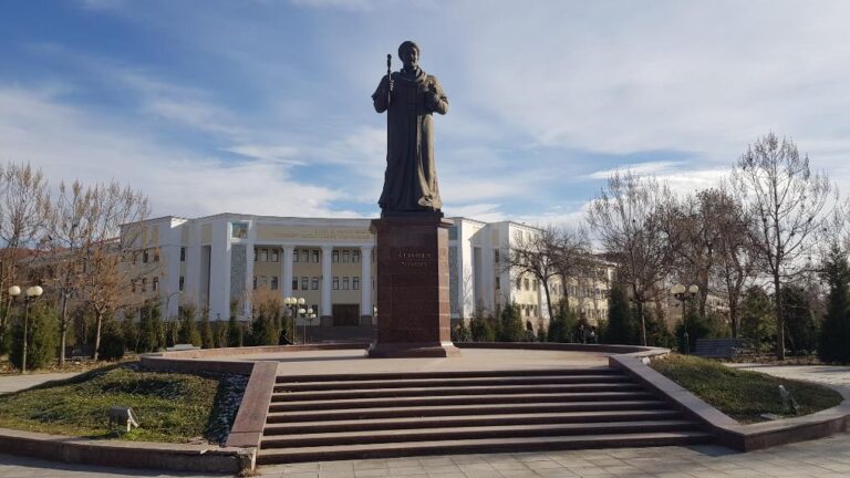 The statue of Alisher Navoi and the Alisher Navoi State University of Uzbek Language and Literature. Uzbekistan, the country in the heart of Central Asia