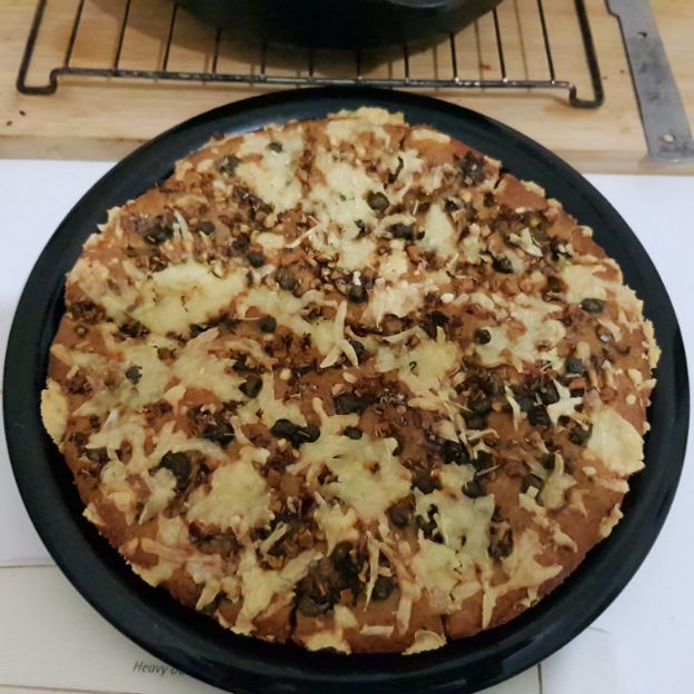 Garlic and capers flat bread on flaxseed dough. The benefits of cooking as a hobby